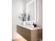 Modern bathroom with sleek vanity, illuminated mirror, and stylish fixtures, creating a spa-like experience at 614 Queens Rd, Charlotte, NC 28207