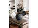 Stylish living room decor featuring a vase with artistic branches, adding a touch of elegance to the space at 614 Queens Rd, Charlotte, NC 28207