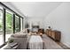 Inviting living room with large sliding doors, modern furniture, and stylish decor at 614 Queens Rd, Charlotte, NC 28207