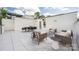 Entertaining rooftop deck equipped with stylish lounge and dining areas and chic white pavers at 614 Queens Rd, Charlotte, NC 28207