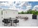 Stylish rooftop deck showcasing comfortable seating, a dining area, and panoramic city views at 614 Queens Rd, Charlotte, NC 28207