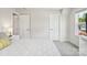 Bright bedroom showcases natural light, a comfortable bed, and easy access to other rooms at 6295 Ashton Park Dr, Denver, NC 28037