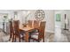 Dining room features a wooden table and chairs with natural light and modern design at 6295 Ashton Park Dr, Denver, NC 28037
