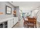Dining room features a wooden table and chairs with natural light and an open floor plan at 6295 Ashton Park Dr, Denver, NC 28037