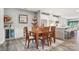 Dining room features a wooden table and chairs, with natural light and an open layout at 6295 Ashton Park Dr, Denver, NC 28037