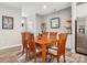 Dining room featuring wooden table and chairs, natural light, and modern design at 6295 Ashton Park Dr, Denver, NC 28037