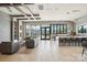 Bright community lobby featuring comfortable seating, a kitchen area, and plenty of natural light at 6295 Ashton Park Dr, Denver, NC 28037