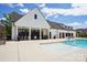 Relaxing pool area with a spacious pool deck perfect for lounging at the community clubhouse at 6295 Ashton Park Dr, Denver, NC 28037