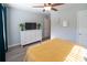 Cozy bedroom featuring modern gray dresser, hardwood floors, and a bright, airy atmosphere at 6300 Bill Sain Rd, Vale, NC 28168
