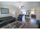 Open floor plan with living room featuring vaulted ceilings, open to kitchen and dining at 6300 Bill Sain Rd, Vale, NC 28168