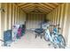Spacious unfinished shed interior, perfect for storage of bikes, grill, and lawn equipment at 6300 Bill Sain Rd, Vale, NC 28168