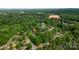 An aerial view of a neighborhood with mature trees and landscaping showcasing community and serene atmosphere at 709 Weldon Ln, Salisbury, NC 28146