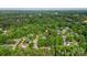 An aerial shot of a tree-filled community with homes nestled among mature trees, offering privacy and natural beauty at 709 Weldon Ln, Salisbury, NC 28146