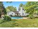 Spacious backyard featuring a pool, well-manicured lawn, and plenty of room for outdoor activities at 709 Weldon Ln, Salisbury, NC 28146