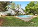 Backyard with pool, deck, and patio area ideal for entertaining and relaxation at 709 Weldon Ln, Salisbury, NC 28146