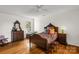 Spacious bedroom featuring a bed, wooden dresser, and hardwood floors at 709 Weldon Ln, Salisbury, NC 28146