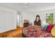 Bright bedroom with closet space, hardwood floors and natural light from the window at 709 Weldon Ln, Salisbury, NC 28146