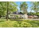 Charming two-story home with a well-manicured lawn and a welcoming porch at 709 Weldon Ln, Salisbury, NC 28146