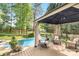 Beautiful backyard pool area with a covered gazebo and comfortable seating at 709 Weldon Ln, Salisbury, NC 28146