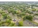 An aerial shot of a neighborhood showcasing houses and trees at 722 English St, Monroe, NC 28110