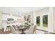 Bright dining area with french doors and kitchen view at 722 English St, Monroe, NC 28110