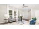 Inviting living room with large windows, a comfortable sofa, and chic decor at 722 English St, Monroe, NC 28110