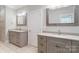 Neutral bathroom featuring tile floor and double vanity at 7358 Bay Cove Ct, Denver, NC 28037