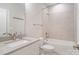 Bathroom featuring vanity and tile tub shower at 7358 Bay Cove Ct, Denver, NC 28037