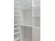 Walk-in closet with extensive built-in shelving and drawers at 7358 Bay Cove Ct, Denver, NC 28037