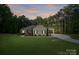 Charming single-story home with a well-manicured lawn and lovely landscaping at 7358 Bay Cove Ct, Denver, NC 28037