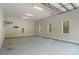 Spacious garage with lighting and wall mount at 7358 Bay Cove Ct, Denver, NC 28037