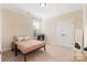 This bedroom has neutral carpet, a double closet and overhead lighting at 7405 Albemarle Dr, Denver, NC 28037