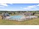 Resort-style community pool with ample seating, a clubhouse, and a playground, perfect for Gathering enjoyment at 7405 Albemarle Dr, Denver, NC 28037