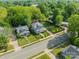 Aerial view of a neighborhood featuring lush greenery and well-maintained homes at 822 W Front St, Statesville, NC 28677