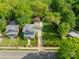 Areal shot featuring a beautiful home and large back yard with a two car garage at 822 W Front St, Statesville, NC 28677