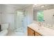 Cozy bathroom featuring a glassed in shower, updated fixtures, and a modern design at 822 W Front St, Statesville, NC 28677