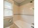 Bathroom with soaking tub and white subway tiles at 822 W Front St, Statesville, NC 28677