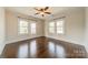 Bedroom with hardwood floors, lots of natural light and trim at 822 W Front St, Statesville, NC 28677