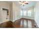 Bright bedroom with hardwood floors, large windows, and trim at 822 W Front St, Statesville, NC 28677