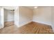 Unfurnished bedroom with hardwood floors and lots of space to customize to your taste at 822 W Front St, Statesville, NC 28677