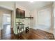 Laundry room with sink, storage, and window at 822 W Front St, Statesville, NC 28677