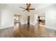 Bright living room with hardwood floors and clear views into other rooms of the house at 822 W Front St, Statesville, NC 28677