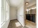 Walk-in closet with shelving next to bathroom at 822 W Front St, Statesville, NC 28677
