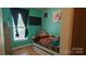 Bright bedroom with a large window, comfortable bed, and plenty of sunlight at 8524 Stoneman Pl, Charlotte, NC 28217