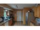 Open concept kitchen features stainless steel appliances and plenty of countertop space at 8524 Stoneman Pl, Charlotte, NC 28217