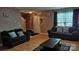 Inviting living room features hardwood floors, neutral paint and comfortable seating at 8524 Stoneman Pl, Charlotte, NC 28217