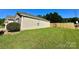 Spacious backyard featuring a lush lawn and privacy fence at 8551 Appledale Dr, Charlotte, NC 28262