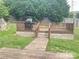 Outdoor deck area perfect for grilling and entertaining, set in a private backyard at 8551 Appledale Dr, Charlotte, NC 28262