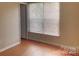 Cozy bedroom featuring durable floors, a bright window and ample natural light at 8551 Appledale Dr, Charlotte, NC 28262