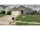 Lovely single-Gathering home with a two-car garage, inviting entrance and manicured lawn at 8551 Appledale Dr, Charlotte, NC 28262